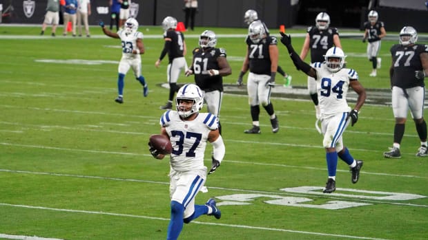 Dec 13, 2020; Paradise, Nevada, USA; Indianapolis Colts strong safety Khari Willis (37) returns an interception for a touchdown in the fourth quarter against the Las Vegas Raiders at Allegiant Stadium. Mandatory Credit: Kirby Lee-USA TODAY Sports
